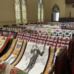 Quilts line the pews of the Dublin First United Methodist Church St. Pat's Top 40